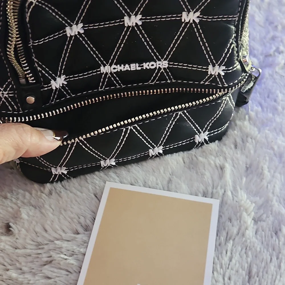 Michael Kors Black and White Quilted Backpack - Picture 5 of 12